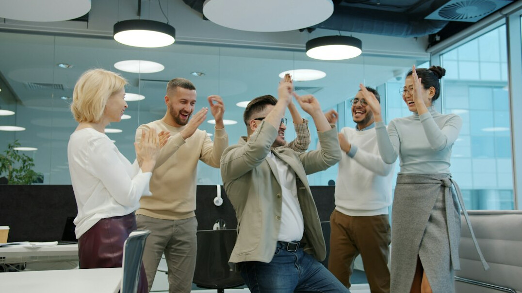 team celebrating health achievements